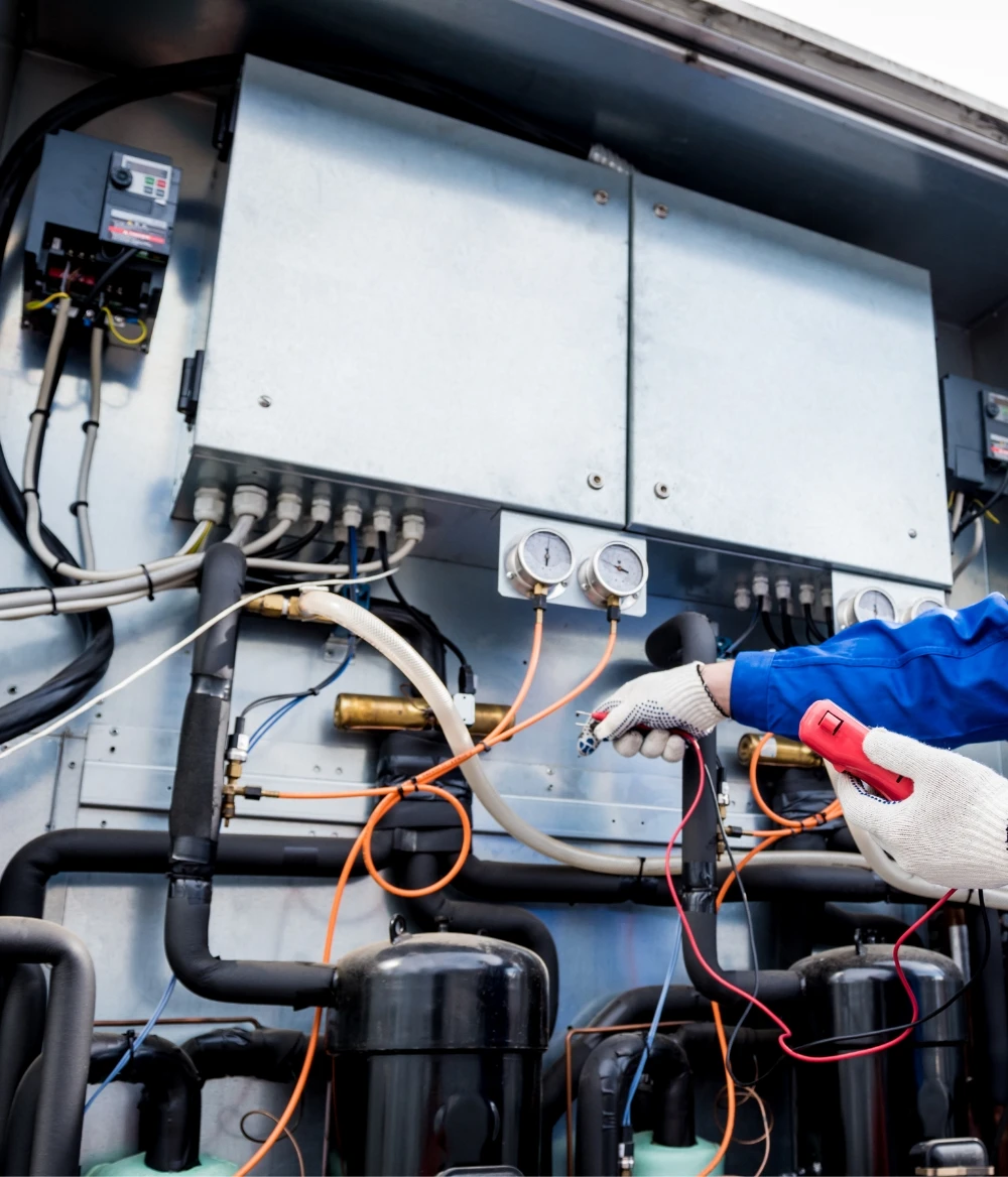 Refrigeration repair technician at work